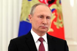 Путин