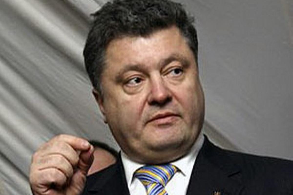 Порошенко ветировал закон о помощи переселенцам из Крыма и Донбасса Порошенко ветировал закон о помощи переселенцам из Крыма и Донбасса