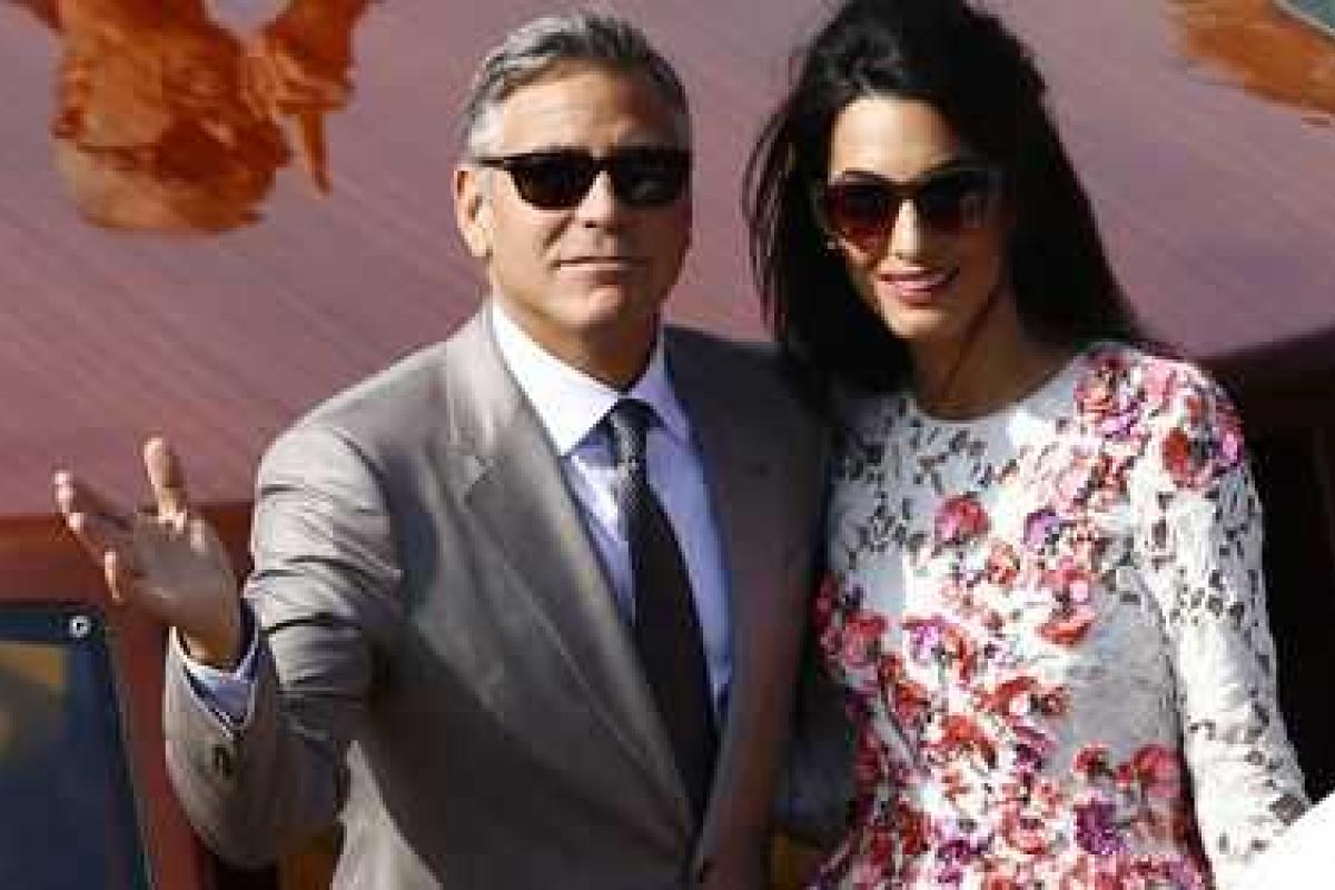 Деньги от продажи свадебных фото Клуни потратит на благотворительность