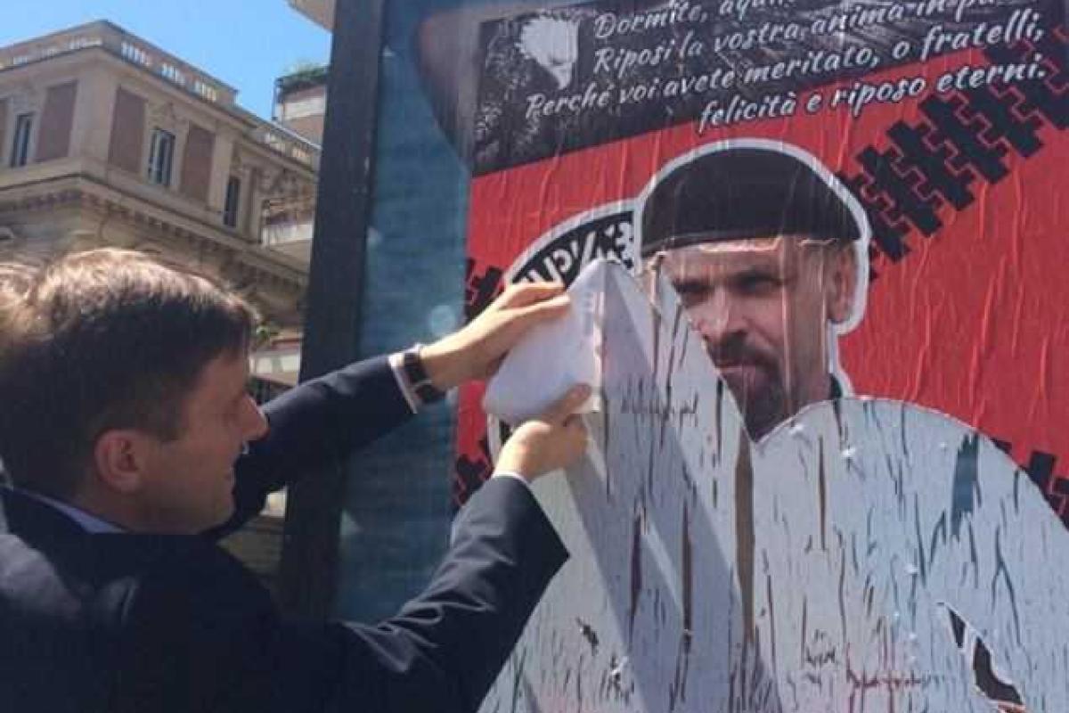 На улицах Рима с плакатов взирает на прохожих главарь "Призрака" 