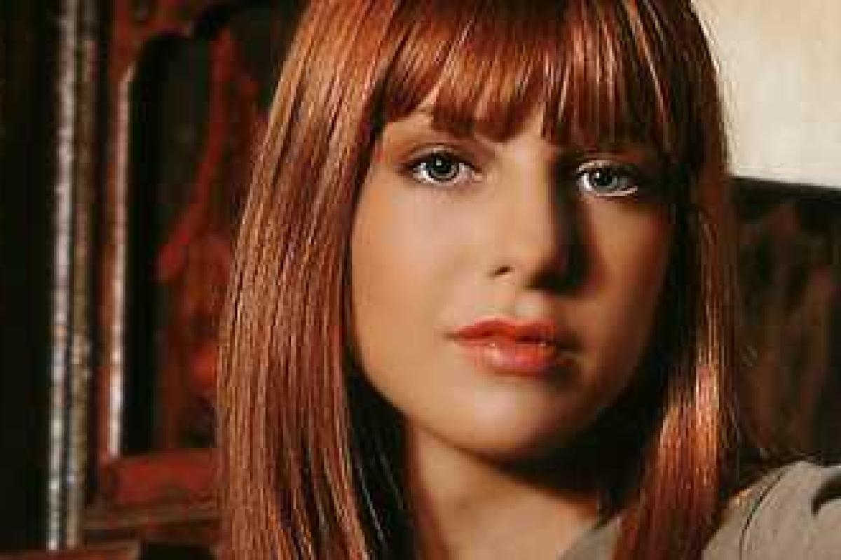 Поклонники Подольской спорят: на кого больше похожа Наталья в новом образе - на куклу или вампира