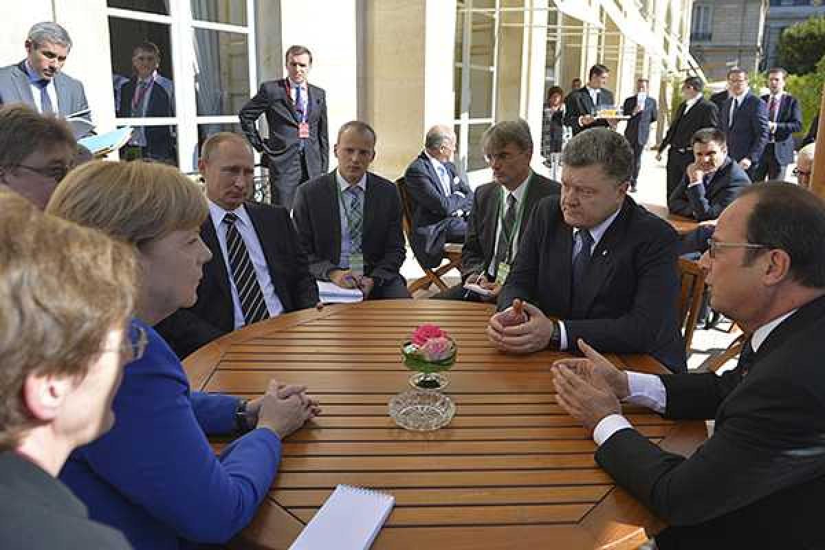 Физиогномик: Счастливыми после переговоров были только Олланд и Меркель, Путин был зол, Порошенко расстроен