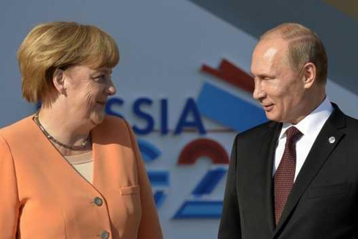 Ангела Меркель стала самым влиятельным лицом 2015 года, сместив Путина на второе место - AFP