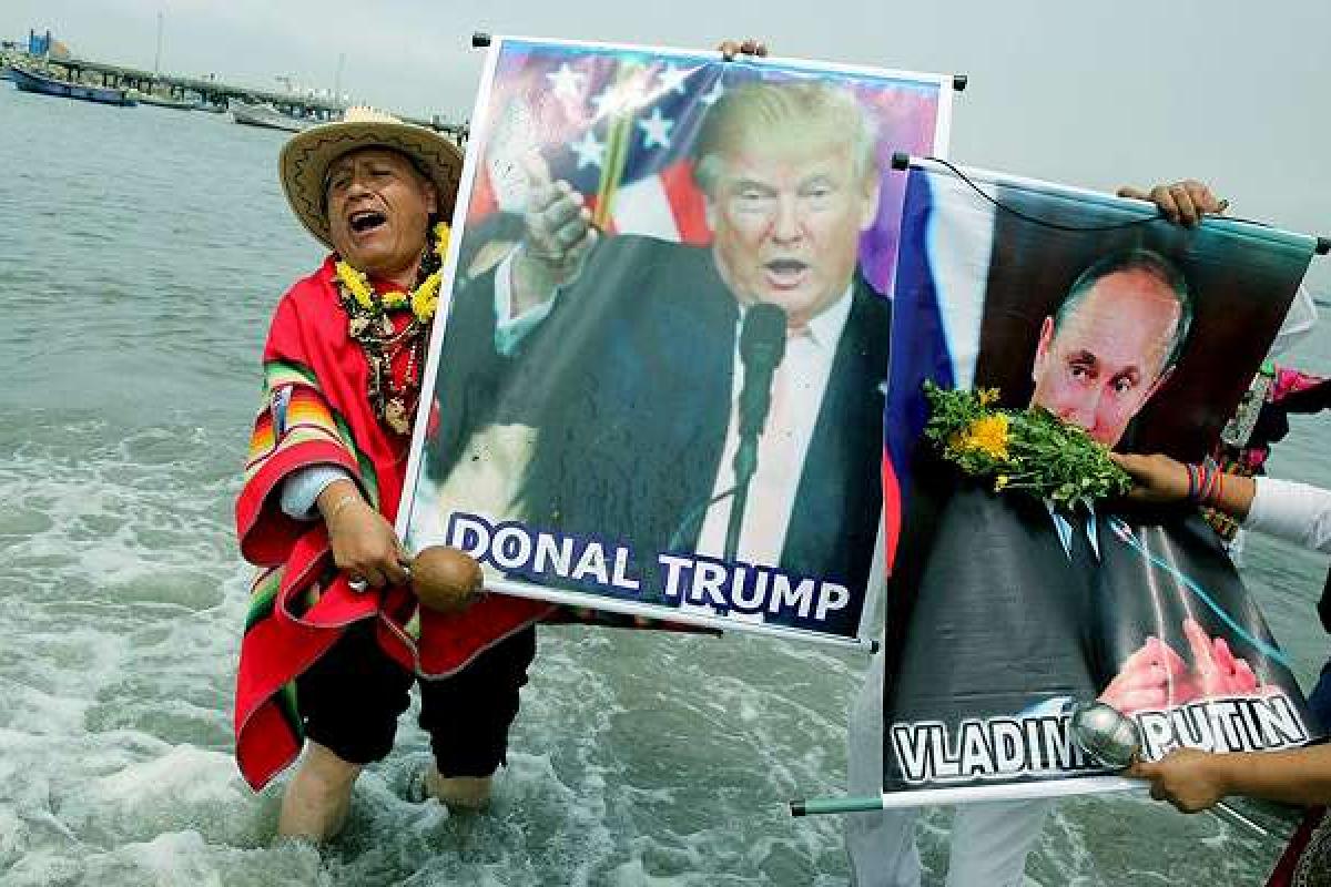Над портретами Путина и Трампа колдовали перуанские шаманы