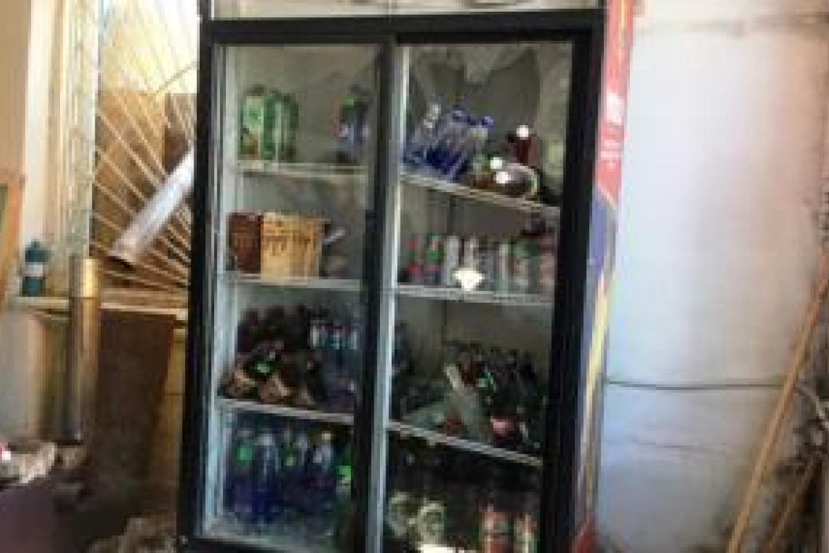 В Волновахе неизвестные обстреляли магазин из ручного противотанкового гранатомета В Волновахе неизвестные обстреляли магазин из ручного противотанкового гранатомета