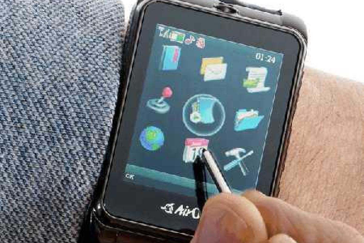 Мобильный телефон-часы? Это очень удобно!