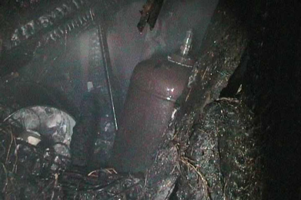 Сумские пожарные предотвратили взрыв газовых баллонов в горящем гараже Сумские пожарные предотвратили взрыв газовых баллонов в горящем гараже