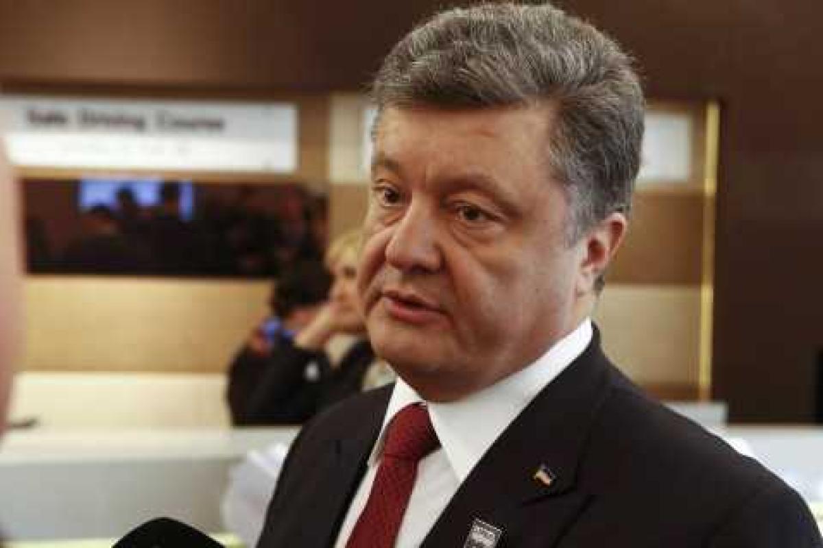 Порошенко: Путин займется освобождением из плена бойца "Рахмана" Порошенко: Путин займется освобождением из плена бойца "Рахмана"