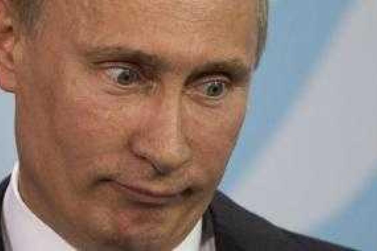 Житель Симферополя меняет портрет Путина на еду Житель Симферополя меняет портрет Путина на еду