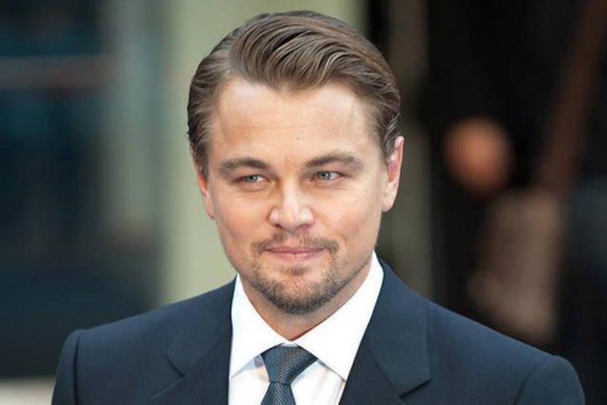 Леонардо Ди Каприо застукали за страстными поцелуями с неизвестной блондинкой