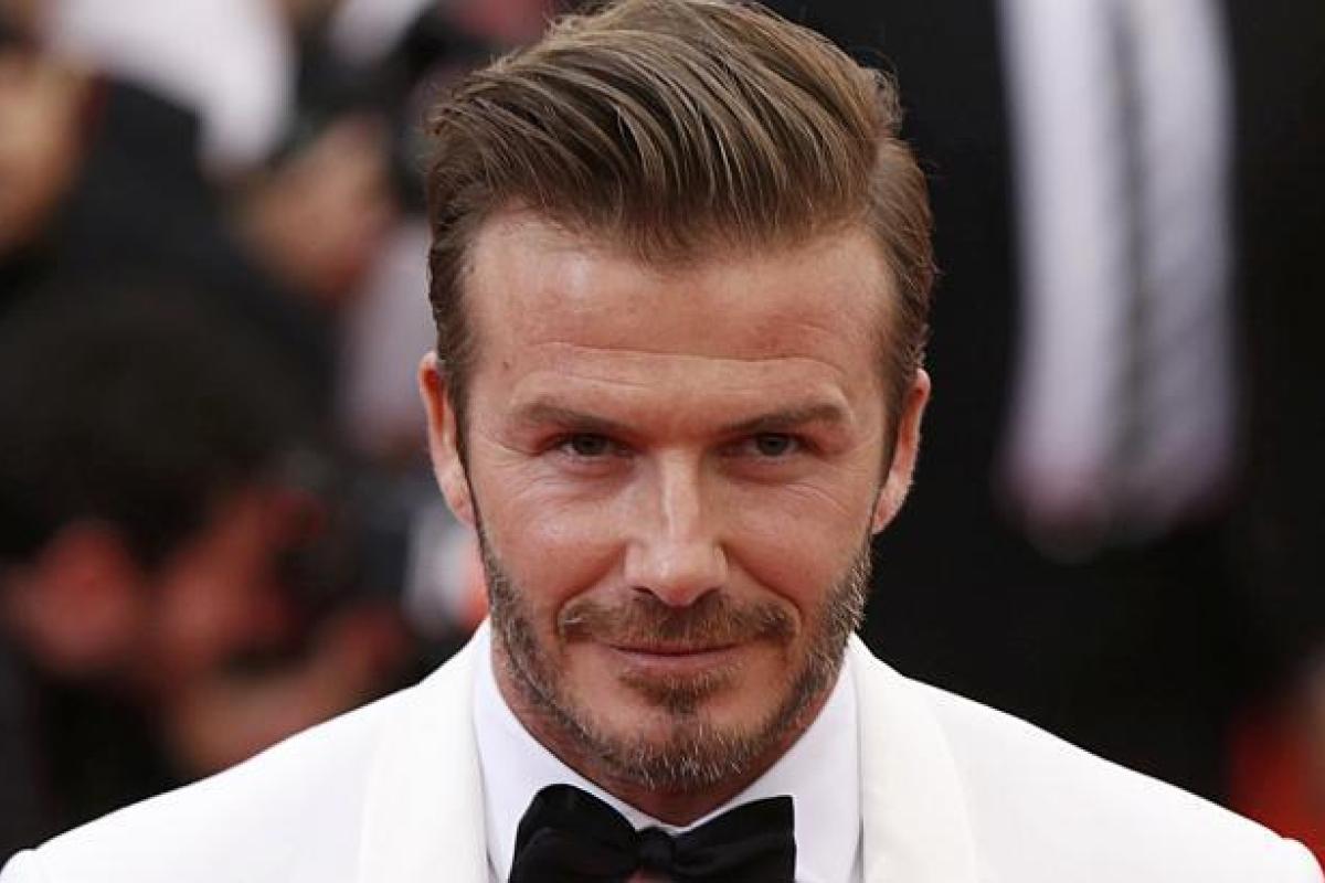 Футболист Дэвид Бекхэм высмеял старшего сына перед тысячами поклонниц