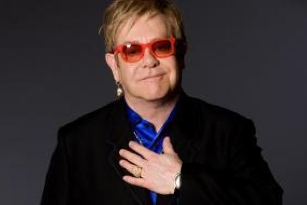 Элтон Джон поделился секретом семейного счастья Элтон Джон поделился секретом семейного счастья
