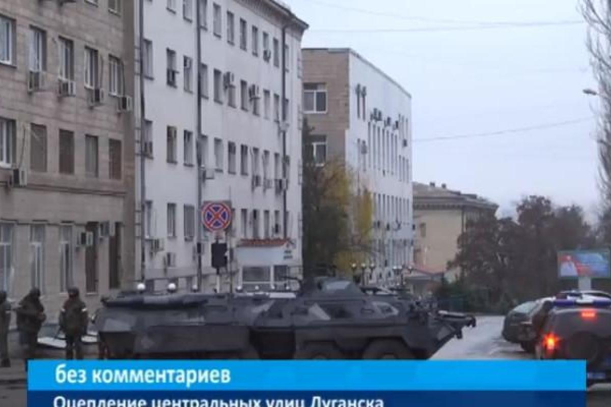 Центр Луганска оцеплен вооруженными людьми: к зданию «МВД» подогнали БТР Центр Луганска оцеплен вооруженными людьми: к зданию «МВД» подогнали БТР