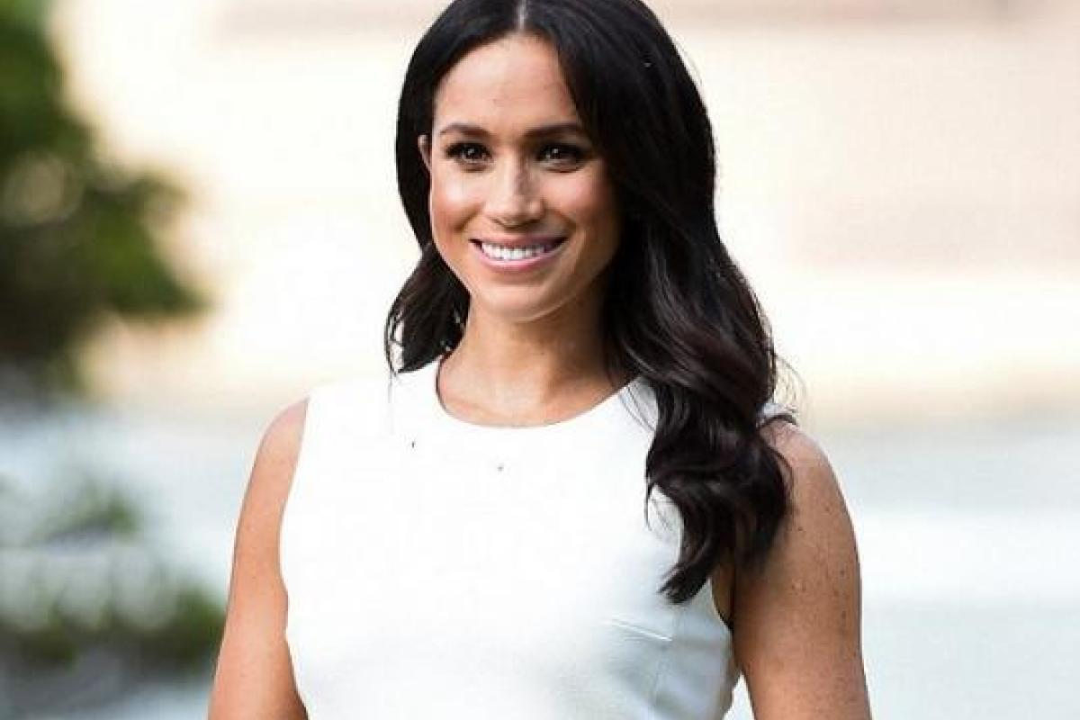 Меган Маркл вышла в свет с округлившимся животом Меган Маркл вышла в свет с округлившимся животом