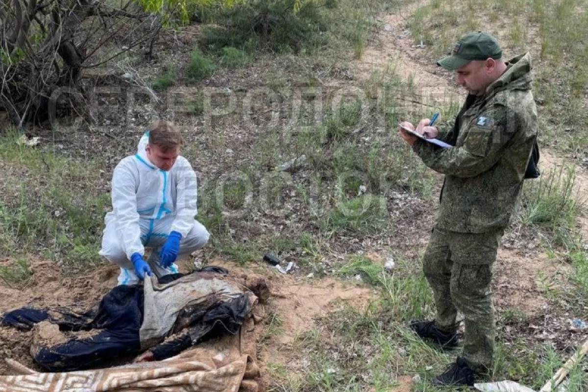 В Рубежном оккупанты раскапывают могилы погибших от обстрелов жителей