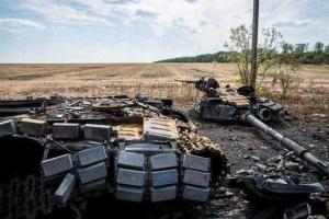 СМИ: Под Иловайском продолжается поиск тел погибших солдат 