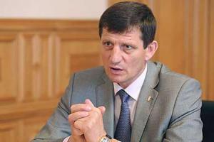 Обострение ситуации в Украине порождено вторжением войск РФ - А.Сыч