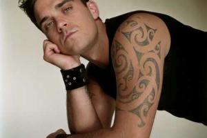 Робби Уильямс пением помогал жене рожать