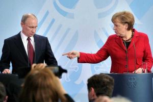 Меркель и Путин более часа с глазу на глаз обсуждали ситуацию на Донбассе