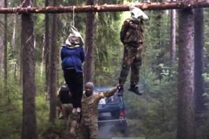 В сети появился очередной фейк-ужастик: Казнь "ополченца" и его беременной жены 