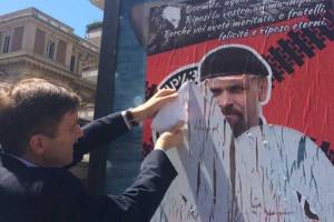 На улицах Рима с плакатов взирает на прохожих главарь "Призрака" 