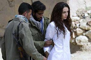 Показательную казнь двух "колдуний" и их мужей провели боевики ИГ 