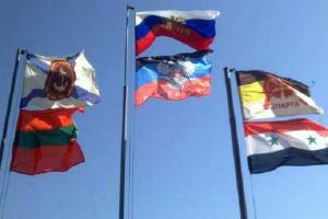 В небе над оккупированным Донецком развевается флаг Сирии 