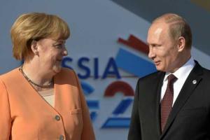 Ангела Меркель стала самым влиятельным лицом 2015 года, сместив Путина на второе место - AFP