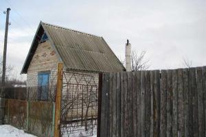 Сотрудники полиции и СБУ обнаружили схрон с боеприпасами в дачном доме в городе Счастье