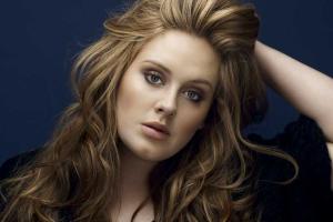 Певица Адель украсит обложку мартовского выпуска журнала "Vogue"