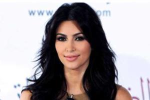 Светская львица Ким Кардашьян снова стала ослепительной блондинкой