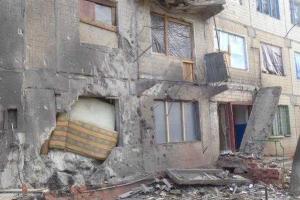 В разбомбленной Горловке люди едят голубей