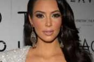 Ким Кардашьян показала свой округлившийся животик