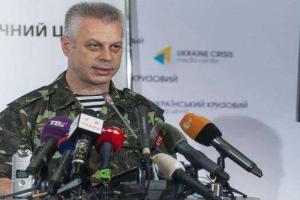 В районе Донецкого аэропорта обстрелы до сих пор продолжаются, - Лысенко