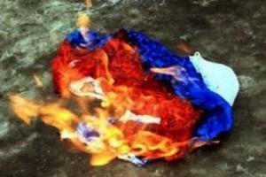 В «ЛНР» задержала юношей и девушку за сожжения российского флага