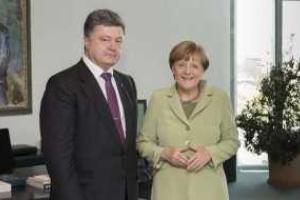 Секретная договоренность Порошенко и Меркель относительно "особого статуса" Донбасса