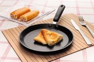 Особенности выбора сковородки для блинов