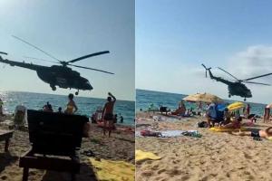 Неспокойно в Крыму: Над головами туристов на пляжах летают и стреляют российские вертолеты