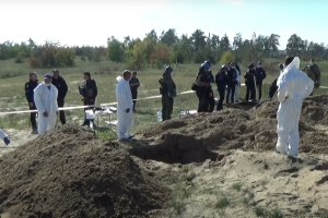 У Лимані ексгумовано перші 20 тіл на місці масового поховання