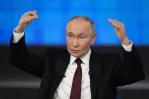 Путін