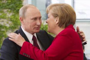 Меркель призвала Путина способствовать успешным выборам в Украине