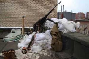 События в Донбассе: в Славянске на крышах домов появляются крупнокалиберные пулеметы