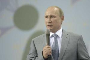 Путин о Порошенко: "У него пока руки не испачканы кровью"