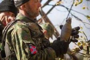 В Донецке на одном из зданий красуется граффити с изображением террориста