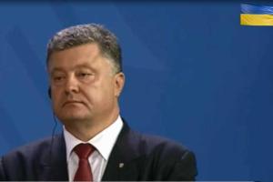 Порошенко в Берлине выступил против новых форматов переговоров по Донбассу