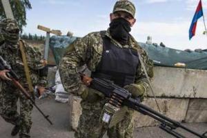 На сайте "Миротворец" боевики обвешаны гранатами, а в соцсетях они обычные "шахтеры" 