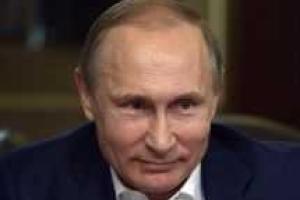 Путин не связывает отмену санкций с минскими соглашениями