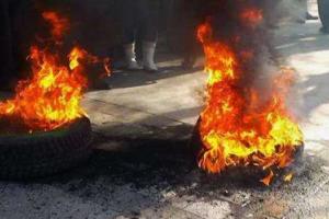 «Автомайдановцы» начали жечь шины под зданием Нацполиции в Виннице