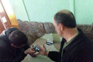 На Львовщине депутата горсовета поймали на взятке за лишение участников АТО земли