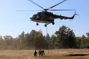 В небе под Днепром летали военные вертолеты 